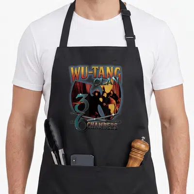 Tablier de cuisine noir avec illustration Wu-Tang Clan 36 Chambers et deux sabres croisés.