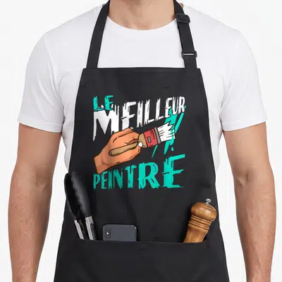 Tablier de cuisine noir avec main tenant un pinceau et texte Le Meilleur Peintre en blanc et turquoise.