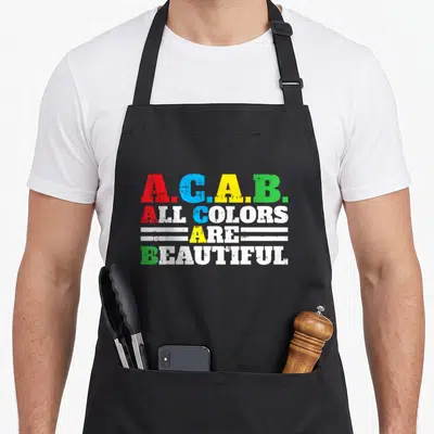 Tablier de cuisine noir avec l'inscription A.C.A.B. Toutes les couleurs sont magnifiques en lettres multicolores style graffiti.