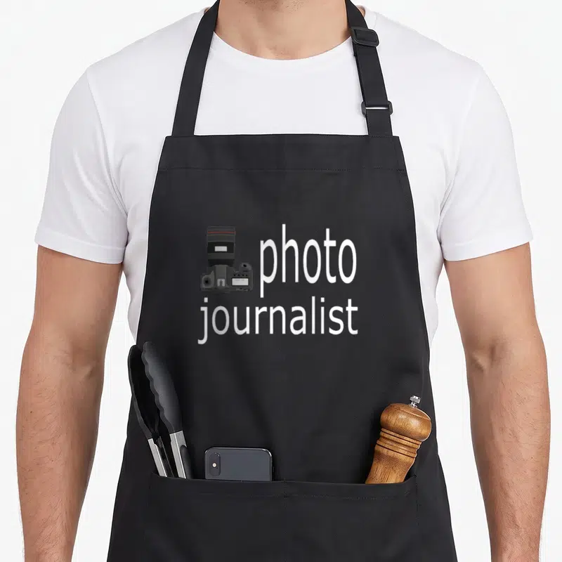 Tablier de cuisine noir avec illustration d'appareil photo et texte blanc photo journalist