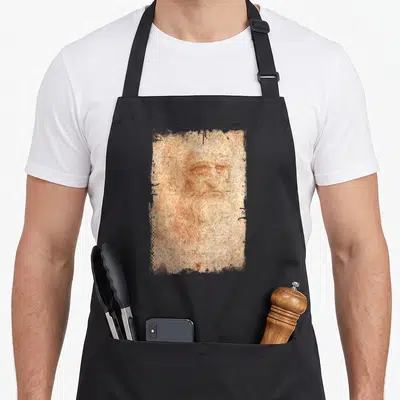 Tablier de cuisine noir avec le portrait de Léonard de Vinci en dessin au sanguine sur papier vieilli.