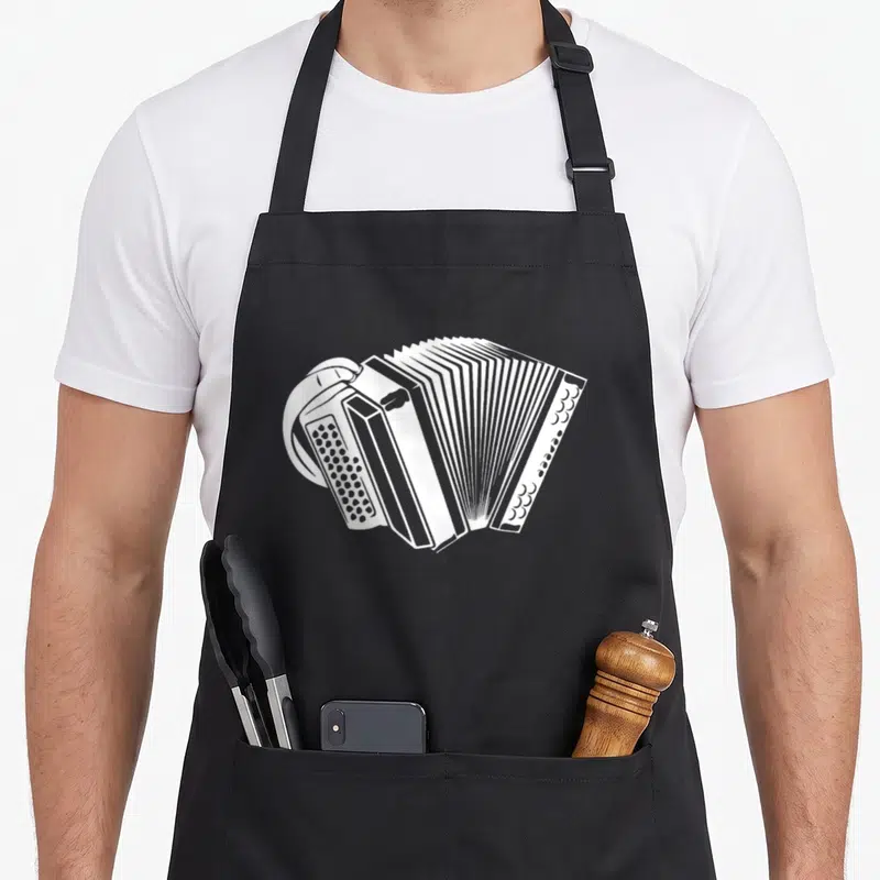 Tablier de cuisine noir avec illustration blanche d'accordéon détaillé sur le devant.