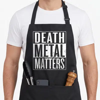 Tablier de cuisine noir avec l'inscription blanche DEATH METAL MATTERS en lettres capitales et style usé.