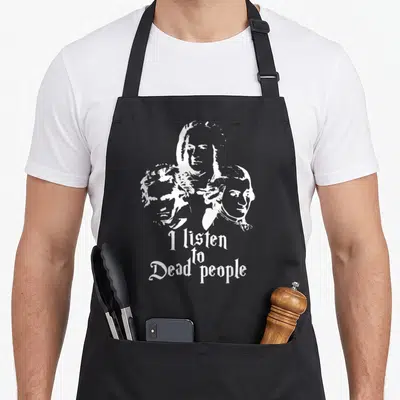 Tablier de cuisine noir avec trois visages en blanc et le texte I listen to dead « people » Mozart Bach Beethoven Musique classique