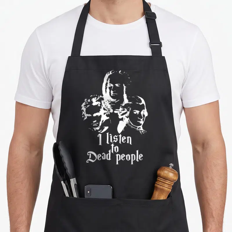 Tablier de cuisine noir avec trois visages en blanc et le texte I listen to dead « people » Mozart Bach Beethoven Musique classique