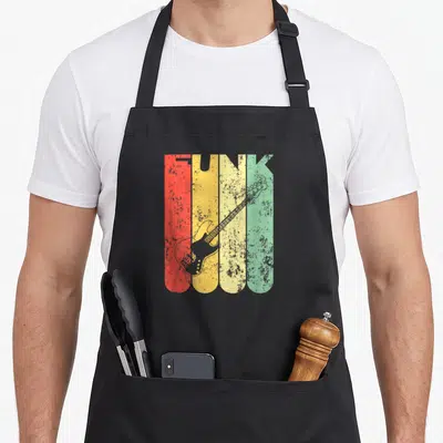 Tablier de cuisine noir avec le mot FUNK en lettres colorées et une illustration de basse électrique vintage superposée.