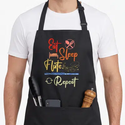 Tablier de cuisine noir avec illustration Eat Sleep Flute Repeat et dessin de flûte bleue.
