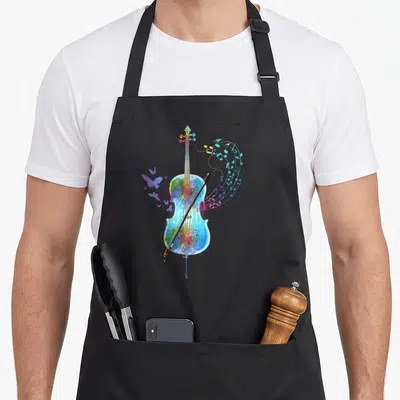 Tablier de cuisine noir avec un violoncelle multicolore, des notes de musique et un papillon violet stylisé sur le devant.