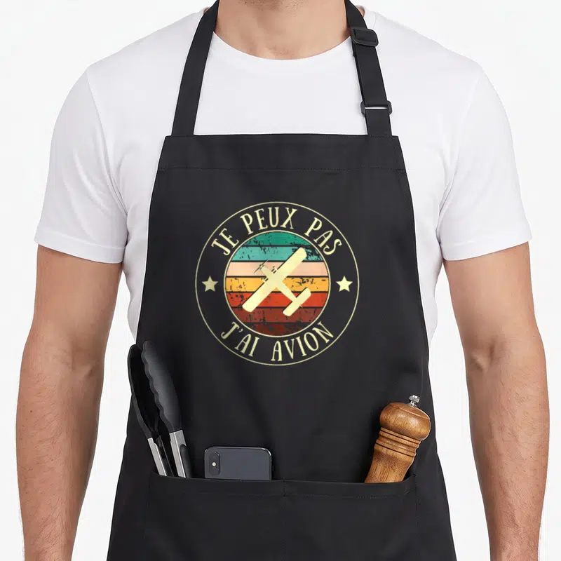 Tablier de cuisine noir avec logo rond vintage Je peux pas j'ai avion et avion croisé sur bandes colorées