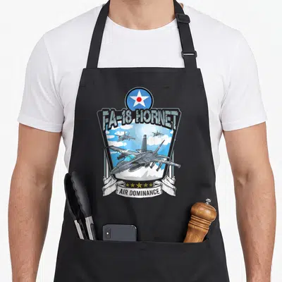Tablier de cuisine noir avec illustration d'avion de chasse FA-18 Hornet et inscription Air Dominance.