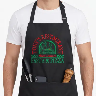 Tablier de cuisine noir avec logo Tony's Restaurant That's Amore Pasta Pizza illustration verte et texte rouge