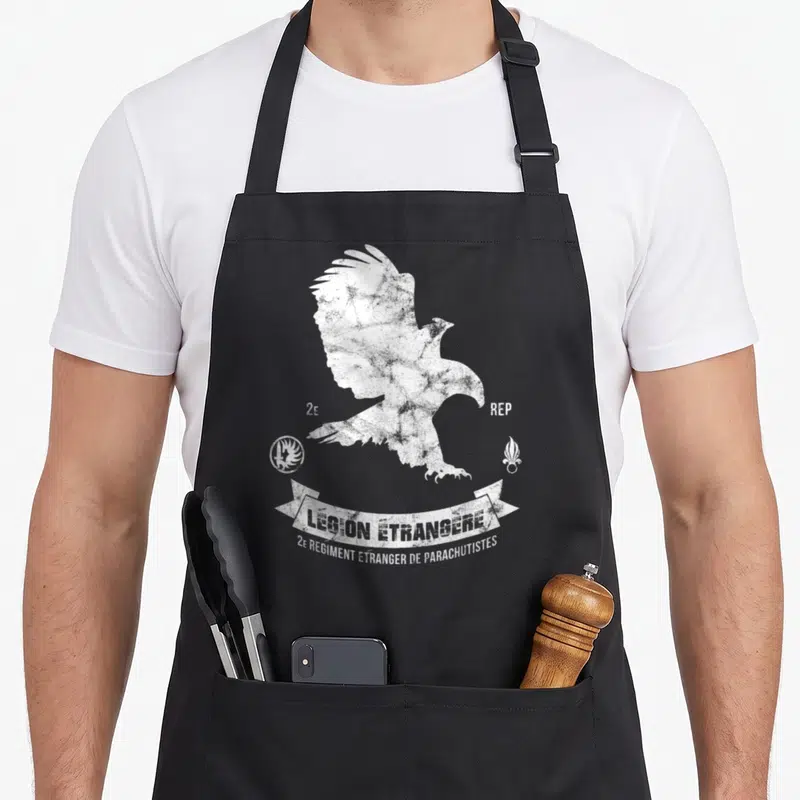 Tablier de cuisine noir avec aigle et insigne Légion étrangère 2e REP en blanc.