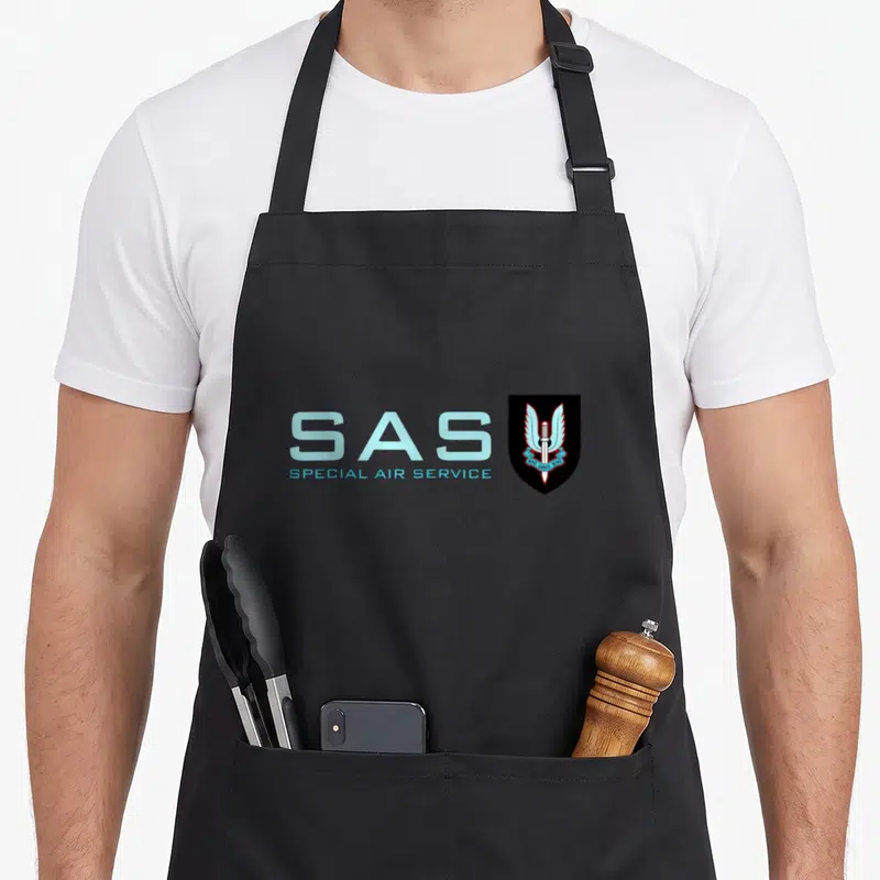 Tablier de cuisine noir avec l'inscription SAS Special Air Service et l'insigne des forces spéciales.