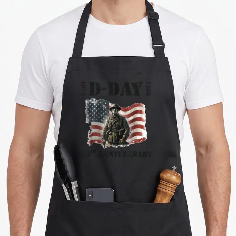 Tablier de cuisine noir avec illustration soldat D-Day et drapeau américain pour le 80e anniversaire.