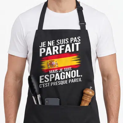 Tablier de cuisine noir avec inscription blanche et drapeau espagnol peint en style brush.