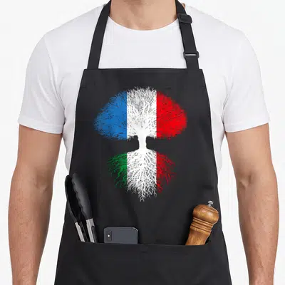 Tablier de cuisine noir avec un arbre stylisé aux branches bleues blanches rouges et racines vertes blanches rouges.