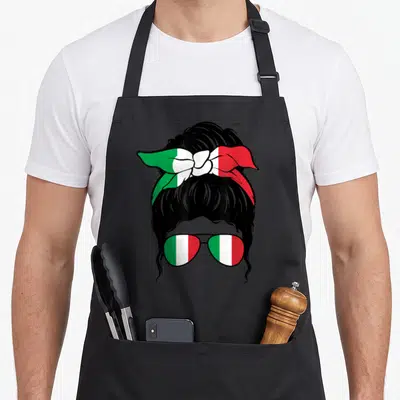 Tablier de cuisine noir avec illustration de fille au chignon, nœud tricolore italien et lunettes aux verres verts blancs et rouges.