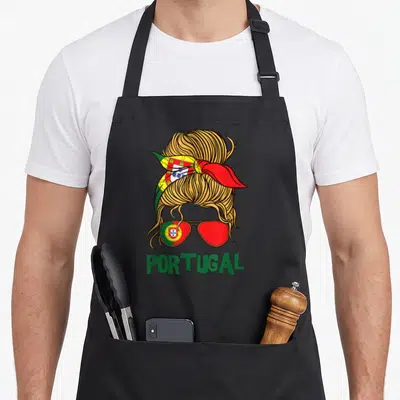 Tablier de cuisine noir avec illustration femme chignon drapeau et lunettes de soleil vertes et rouges