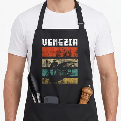 Tablier de cuisine noir avec inscription Venezia et silhouette de gondolier sur bandes orange jaune vertes