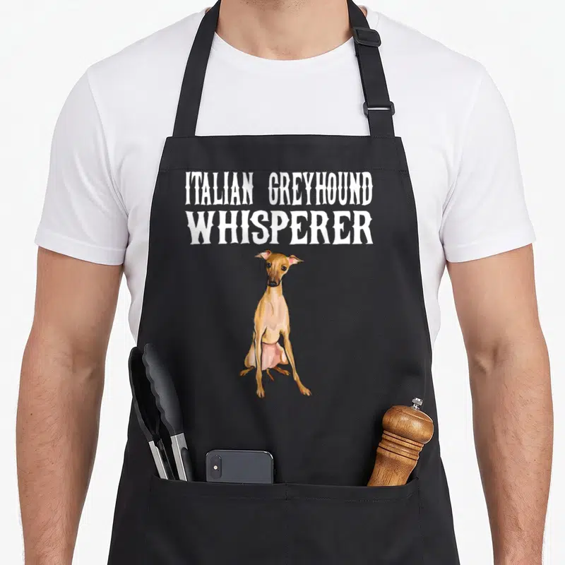 Tablier de cuisine noir avec illustration d'un Lévrier Italien et texte Italian Greyhound Whisperer en blanc.