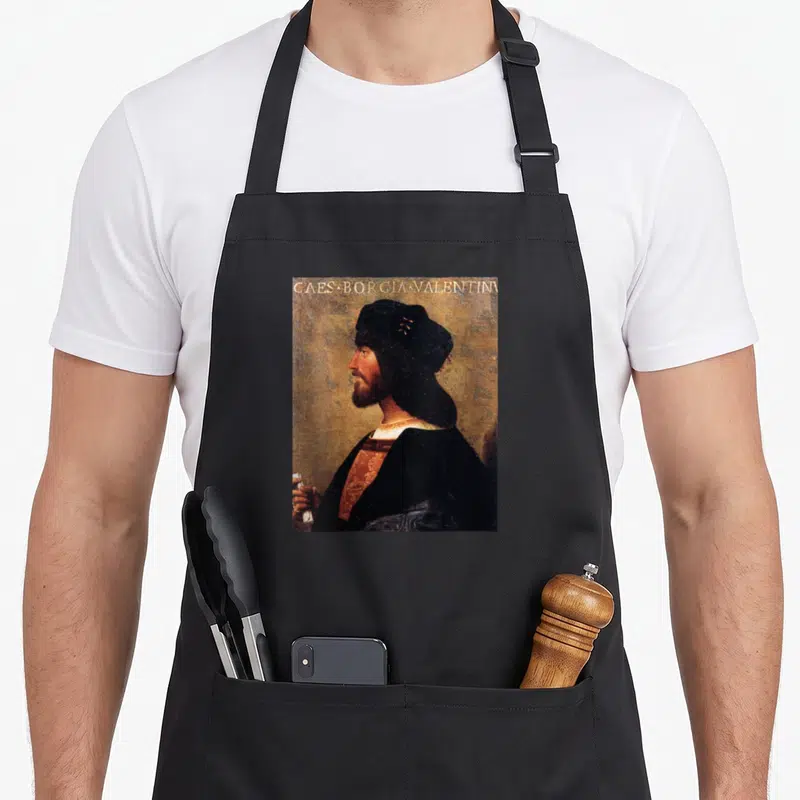 Tablier de cuisine noir avec le portrait de profil de Cesare Borgia Valentin et une inscription latine en haut.