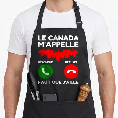 Tablier de cuisine noir avec texte blanc Le Canada m'appelle, trois feuilles d'érable rouges et boutons verts et rouges imitant une interface téléphonique.