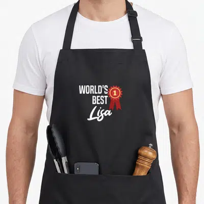 Tablier de cuisine noir avec l'inscription World's Best Lisa et une médaille rouge portant le chiffre 1.