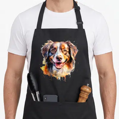 Tablier de cuisine noir avec une illustration aquarelle colorée représentant la tête d'un chien Border Collie souriant.