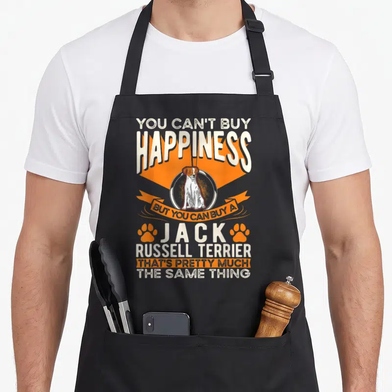 Tablier de cuisine noir avec illustration d'un Jack Russell Terrier et texte blanc sur fond orange.