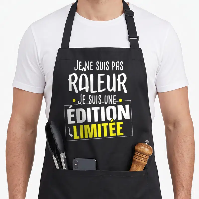 Tablier de cuisine noir avec l'inscription blanche et jaune Je ne suis pas râleur je suis une « édition limitée ».