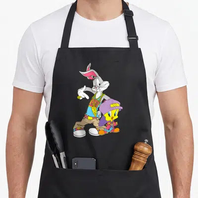 Tablier de cuisine noir avec Bugs Bunny et Tweety déguisés en rappeurs hip hop colorés.