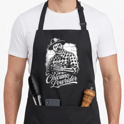 Tablier de cuisine noir avec illustration blanche d'un clown gangster Chicano Lowrider coiffé d'un fedora et portant une chemise à carreaux.