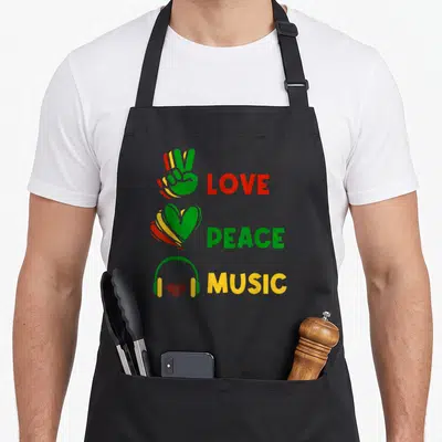 Tablier de cuisine noir avec icones Love Peace Music et symboles rasta vert jaune rouge