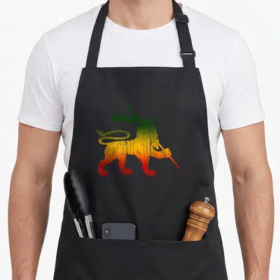 Tablier de cuisine noir avec illustration Lion de Juda aux couleurs vert jaune et rouge style vintage.