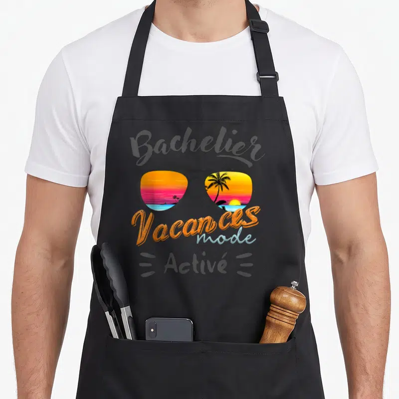 Tablier de cuisine noir avec lunettes de soleil et texte Bachelier Vacances mode Activé