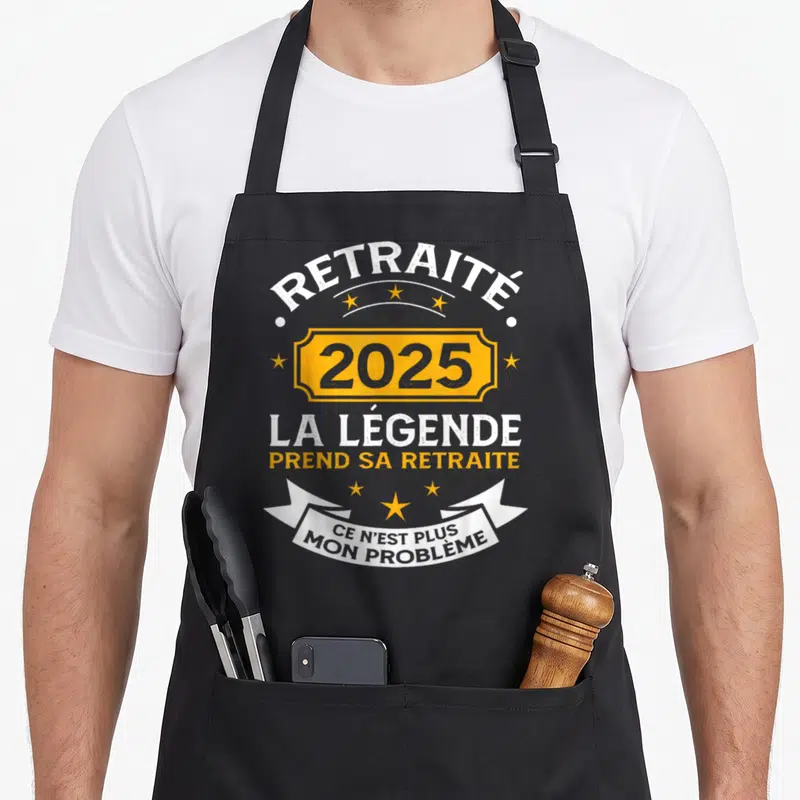 Tablier de cuisine noir avec inscription RETRAITÉE 2025 LA LÉGENDE PREND SA RETRAITE et banderole CE N'EST PLUS MON PROBLÈME.