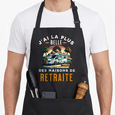 Tablier de cuisine noir avec illustration d'un camping-car et le texte J'ai la plus belle des maisons de retraite.