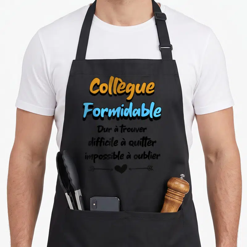 Tablier de cuisine noir avec texte orange et bleu Colleague Formidable Dur a trouver impossible a oublier et une flèche sur un coeur.