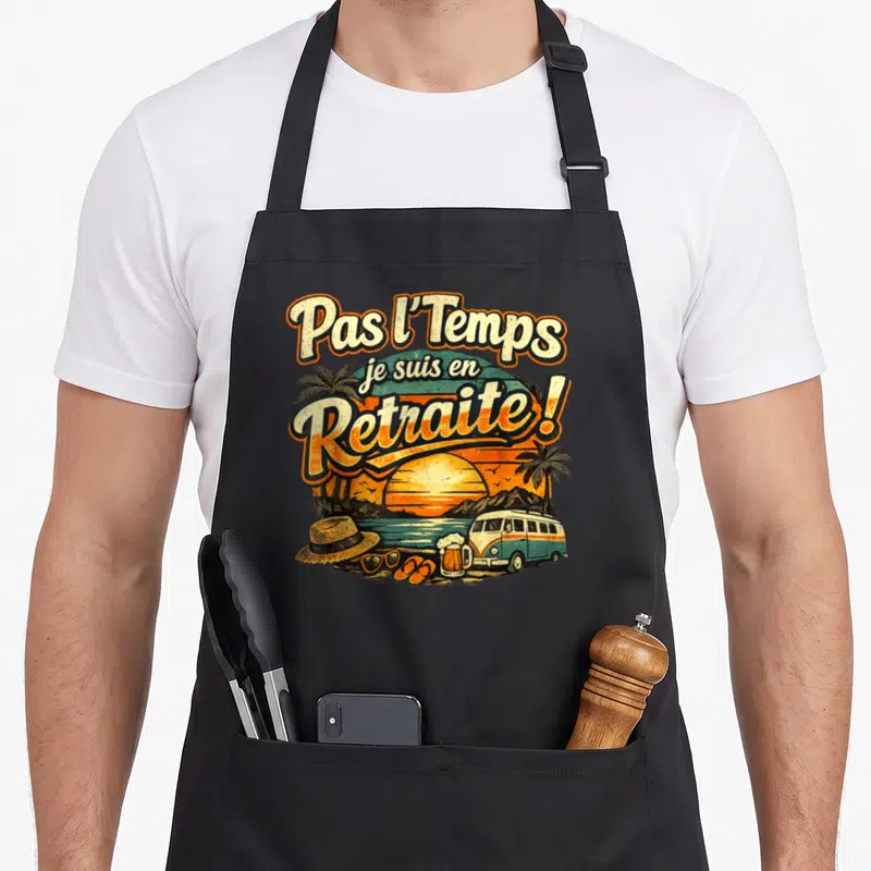 Tablier de cuisine noir avec illustration vintage d'un camping-car au bord de la mer et une bière.