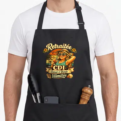 Tablier de cuisine noir avec illustration d'une femme en vacances et texte Retraitée CDI Congé à Durée Illimitée.