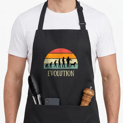 Tablier de cuisine noir avec illustration évolution chasseur homme et chien sur fond arc-en-ciel vintage