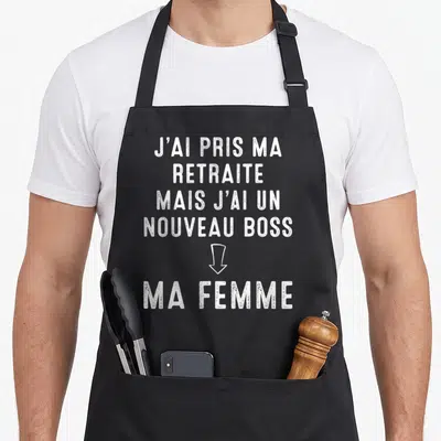 Tablier de cuisine noir avec inscription blanche J'ai pris ma retraite mais j'ai un nouveau boss ma femme et une flèche.