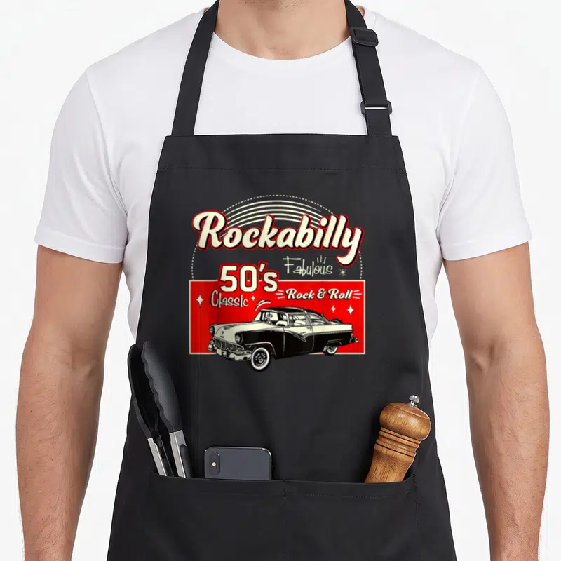 Tablier de cuisine noir avec illustration vintage d'une voiture blanche et noire sous le texte Rockabilly 50's Fabulous Classic Rock & Roll.