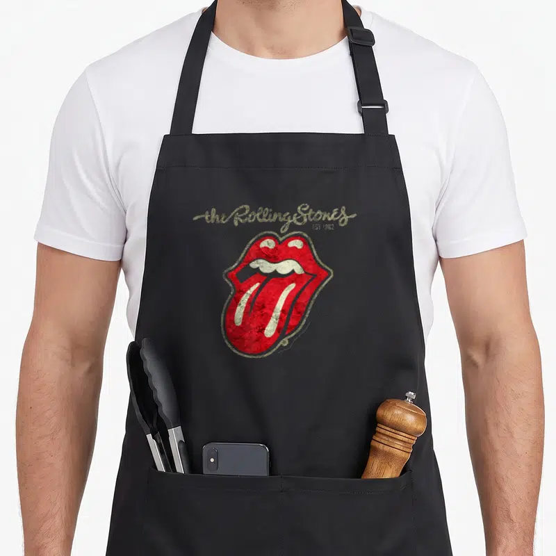 Tablier de cuisine noir avec logo lèvres rouges et doré et texte script