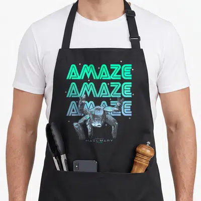 Tablier de cuisine noir avec l'illustration néon de l'alien Amaze et le logo Project Hail Mary en bas.