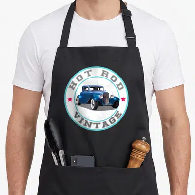 Tablier de cuisine noir avec logo circulaire Hot Rod Vintage et voiture bleue rétro.