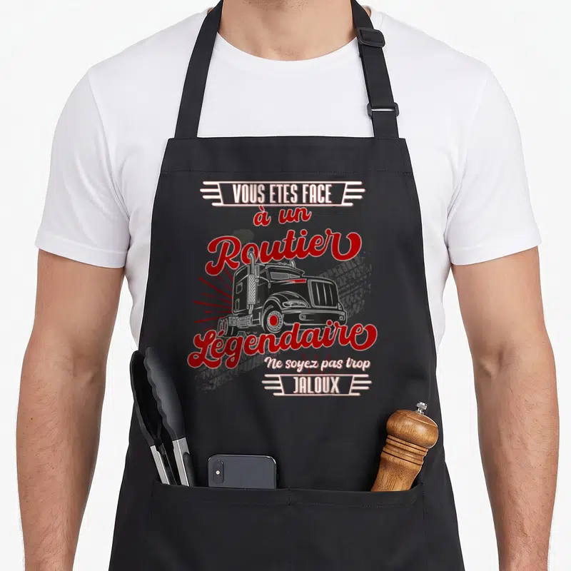 Tablier de cuisine noir avec illustration de camion vintage et texte rouge vous êtes face à un routier légendaire ne soyez pas trop jaloux