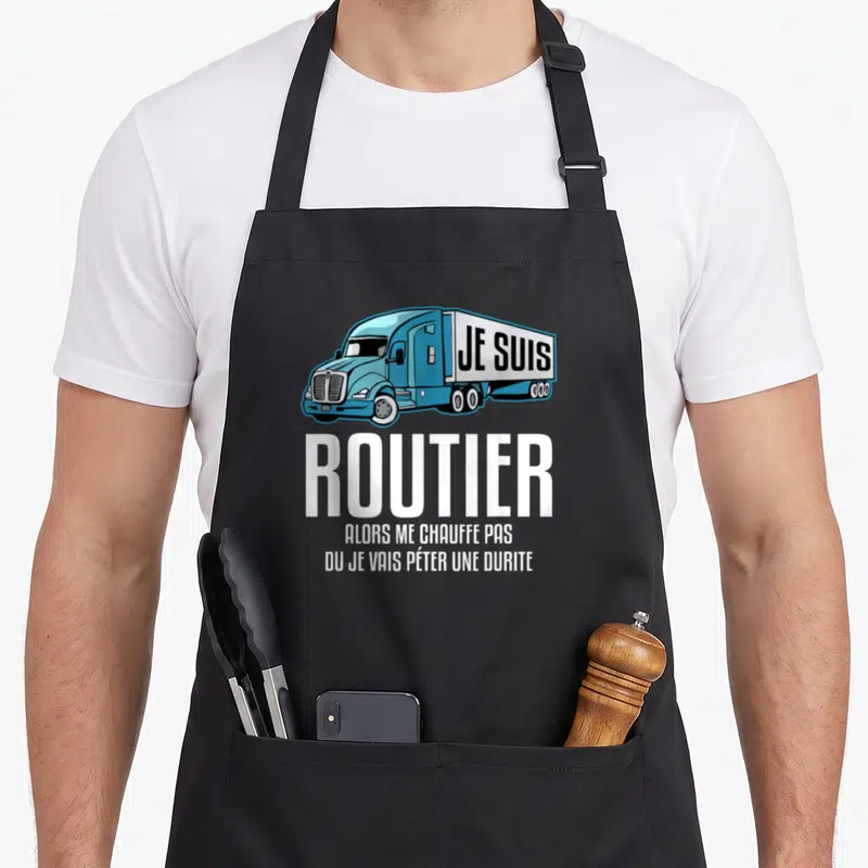 Tablier de cuisine noir avec illustration semi-remorque bleu et texte blanc humoristique sur la profession de routier.