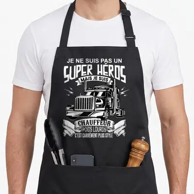 Tablier de cuisine noir avec illustration de truck américain et texte humoristique sur la profession de chauffeur.