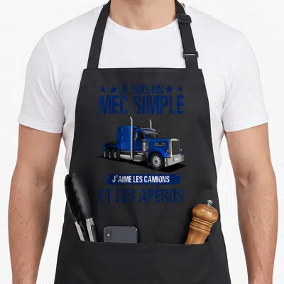 Tablier de cuisine noir avec illustration semi-remorque bleue et texte mec simple j'aime les camions et les apéros en typographie distressed.